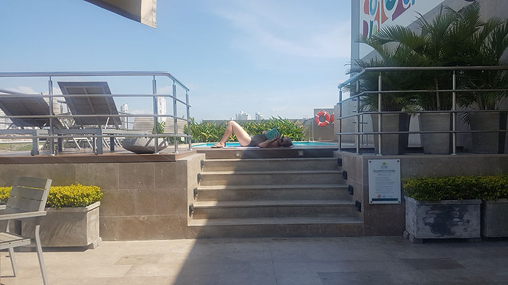 Billie sunning her legs in her super cool swimsuit, Cartagena